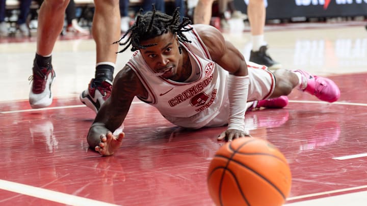 Feb 14, 2026; Tuscaloosa, AL, USA; Alabama guard Latrell Wrightsell Jr. (3) goes to the floor as he loses the ball in the lane at Coleman Coliseum. Alabama defeated South Carolina 89-75. Mandatory Credit: Gary Cosby Jr.-Tuscaloosa News