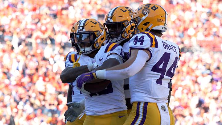 Oct 24, 2026; Auburn, Alabama, USA;  LSU Tigers running back Dilin Jones (13) celebrates with teammates after scoring a touchdown during the fourth quarter against the Auburn Tigers at Jordan-Hare Stadium.  Mandatory Credit: John Reed-Imagn Images