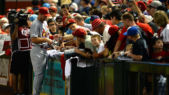 Sep 23, 2019; Phoenix, AZ, USA; St. Louis Cardinals first baseman Paul Goldschmidt (46) signs autographs prior to the game against the Arizona Diamondbacks at Chase Field. Mandatory Credit: Joe Camporeale-Imagn Images Sep 23, 2019; Phoenix, AZ, USA; St. Louis Cardinals first baseman Paul Goldschmidt (46) signs autographs prior to the game against the Arizona Diamondbacks at Chase Field. Mandatory Credit: Joe Camporeale-Imagn Images