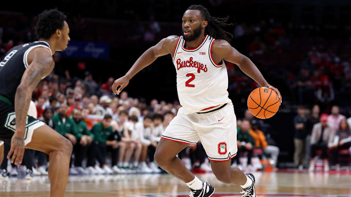 Nov 25, 2024; Columbus, Ohio, USA;  Ohio State Buckeyes guard Bruce Thornton (2) dribbles as Green Bay Phoenix guard Anthony Roy (9) defends during the second half at Value City Arena. Mandatory Credit: Joseph Maiorana-Imagn Images
