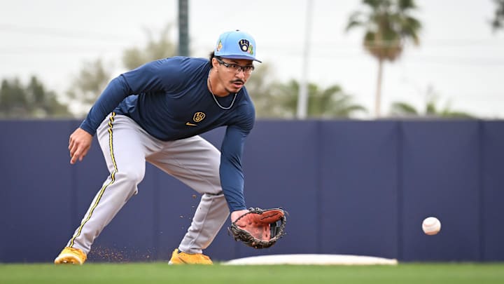Milwaukee Brewers infielder David Hamilton fields a grounder during spring training workouts Monday, February 16, 2026, at American Family Fields of Phoenix in Phoenix, Arizona.