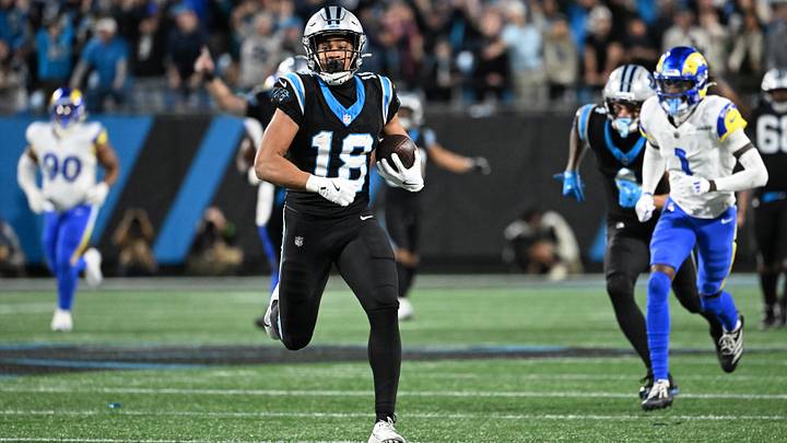 Jan 10, 2026; Charlotte, NC, USA; Carolina Panthers wide receiver Jalen Coker (18) makes a catch against the Los Angeles Rams in the second half during the NFC Wild Card Round game at Bank of America Stadium. 