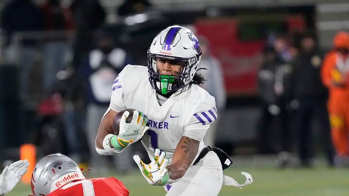 Dec 6, 2024; Birmingham, AL, USA; Saraland's Lawardrick Jones (7) goes low to tackle Parker's Na'eem Offord (1) at Protective Stadium in the 6A State Championship game. Parker defeated Saraland 28-17. Dec 6, 2024; Birmingham, AL, USA; Saraland's Lawardrick Jones (7) goes low to tackle Parker's Na'eem Offord (1) at Protective Stadium in the 6A State Championship game. Parker defeated Saraland 28-17.