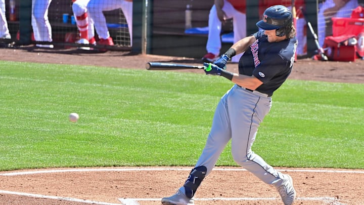 Feb 29, 2024; Tempe, Arizona, USA;  Cleveland Guardians right fielder Chase DeLauter (6)  grounds out in the third inning against the Los Angeles Angels during a spring training game at Tempe Diablo Stadium. Mandatory Credit: Matt Kartozian-Imagn Images