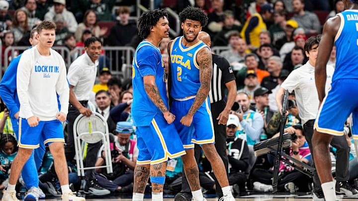 UCLA guard Donovan Dent (2) celebrates a play against Michigan State during the second half of Big Ten tournament quarterfinal at United Center in Chicago on Friday, March 13, 2026.