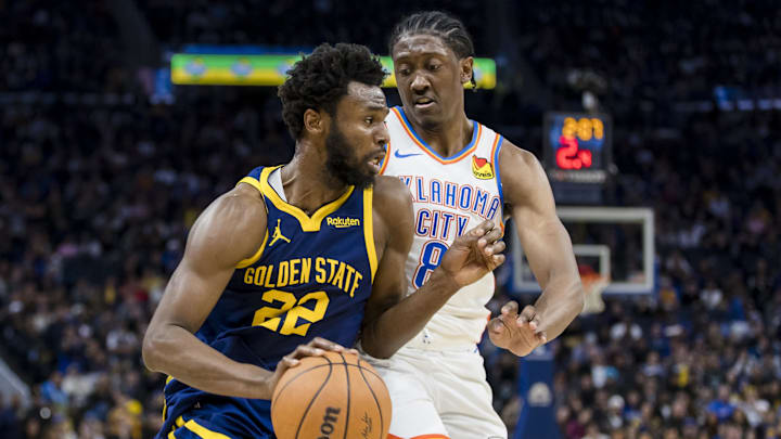 Nov 18, 2023; San Francisco, California, USA; Oklahoma City Thunder forward Jalen Williams (8) defends Golden State Warriors forward Andrew Wiggins (22) during the second half at Chase Center. Mandatory Credit: John Hefti-Imagn Images