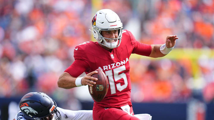 Aug 25, 2024; Denver, Colorado, USA; Denver Broncos linebacker Dondrea Tillman (92) reaches for Arizona Cardinals quarterback Clayton Tune (15) in the second quarter at Empower Field at Mile High. Mandatory Credit: Ron Chenoy-USA TODAY Sports