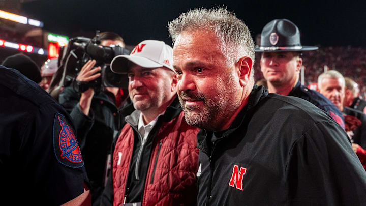 Nov 23, 2024; Lincoln, Nebraska, USA; Nebraska Cornhuskers head coach Matt Rhule and athletic director Troy Dannen walk off the field after defeating the Wisconsin Badgers at Memorial Stadium. Mandatory Credit: Dylan Widger-Imagn Images