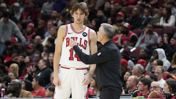 Oct 12, 2024; Chicago, Illinois, USA; Chicago Bulls head coach Billy Donovan talks with Chicago Bulls forward Matas Buzelis (14) during the first half at United Center. Mandatory Credit: David Banks-Imagn Images