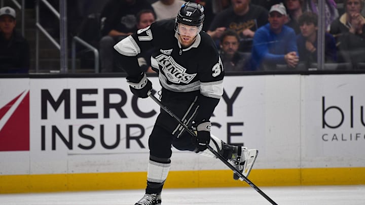 Dec 22, 2025; Los Angeles, California, USA; Los Angeles Kings left wing Warren Foegele (37) shoots on goal against the Columbus Blue Jackets during the second period at Crypto.com Arena. Mandatory Credit: Gary A. Vasquez-Imagn Images