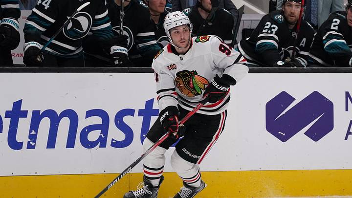 Apr 6, 2026; San Jose, California, USA;  Chicago Blackhawks center Frank Nazar (91) advances the puck against the San Jose Sharks in the third period at SAP Center at San Jose. Mandatory Credit: David Gonzales-Imagn Images