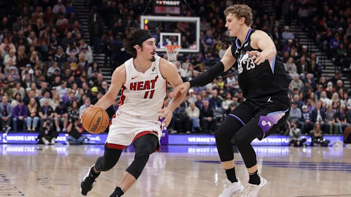 Jan 9, 2025; Salt Lake City, Utah, USA; Miami Heat guard Jaime Jaquez Jr. (11) dribbles by Utah Jazz forward Lauri Markkanen (23) during the second quarter at Delta Center. Mandatory Credit: Chris Nicoll-Imagn Images Jan 9, 2025; Salt Lake City, Utah, USA; Miami Heat guard Jaime Jaquez Jr. (11) dribbles by Utah Jazz forward Lauri Markkanen (23) during the second quarter at Delta Center. Mandatory Credit: Chris Nicoll-Imagn Images