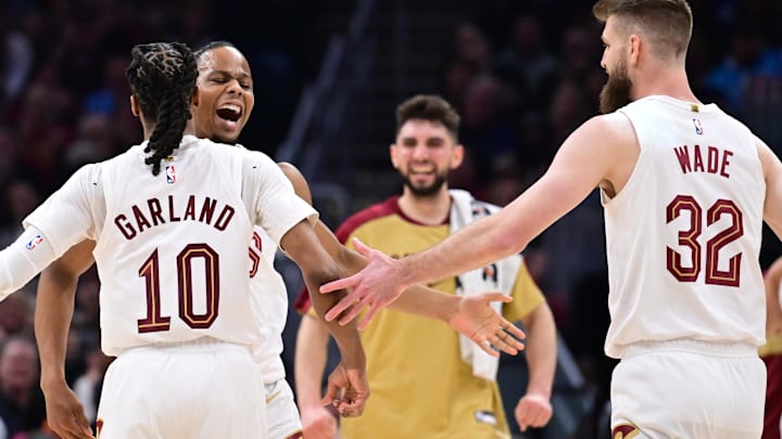 Apr 6, 2025; Cleveland, Ohio, USA; Cleveland Cavaliers forward Isaac Okoro (35) celebrates with guard Darius Garland (10) and forward Dean Wade (32) during the first half against the Sacramento Kings at Rocket Arena. Mandatory Credit: Ken Blaze-Imagn Images