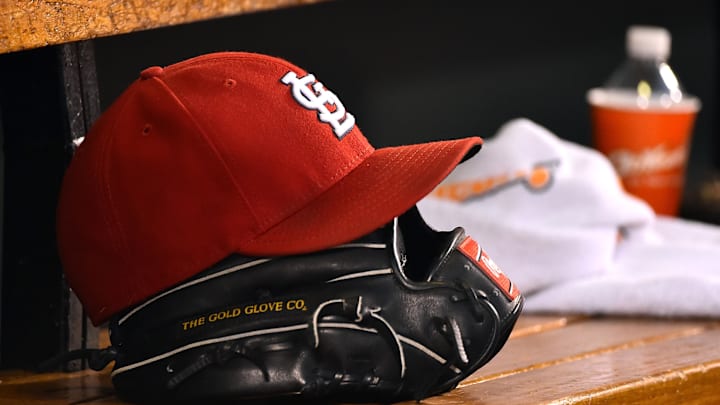 Aug 15, 2015; St. Louis, MO, USA; A detailed view of a baseball glove and St. Louis Cardinals hat in the dugout during the game between the Cardinals and the Miami Marlins at Busch Stadium. Mandatory Credit: Jasen Vinlove-Imagn Images Aug 15, 2015; St. Louis, MO, USA; A detailed view of a baseball glove and St. Louis Cardinals hat in the dugout during the game between the Cardinals and the Miami Marlins at Busch Stadium. Mandatory Credit: Jasen Vinlove-Imagn Images