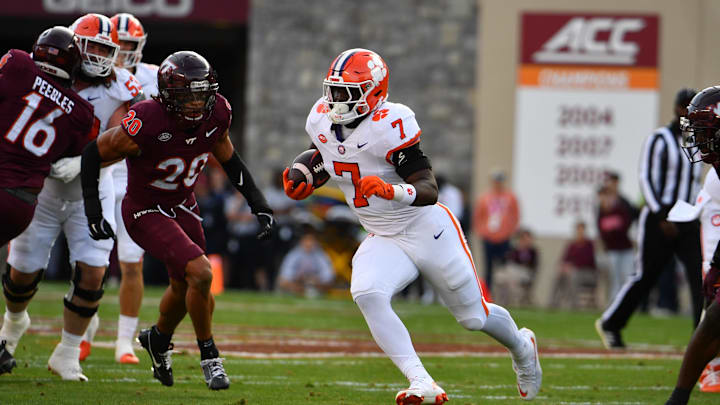 Nov 9, 2024; Blacksburg, Virginia, USA;  Clemson Tigers running back Phil Mafah (7) runs the ball against the Virginia Tech Hokies during the first quarter at Lane Stadium. 