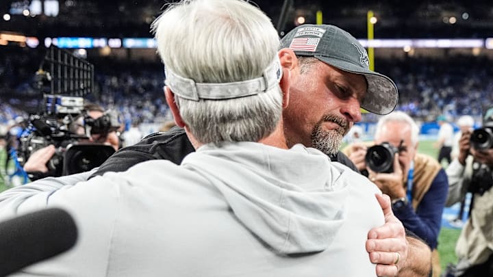Detroit Lions head coach Dan Campbell hugs Jacksonville Jaguars Doug Pederson after 52-6 win 