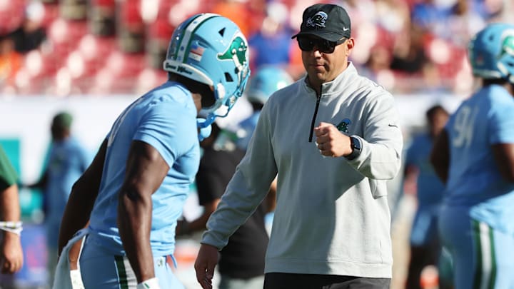 Dec 20, 2024; Tampa, FL, USA; Tulane Green Wave head coach Jon Sumrall  against the Florida Gators prior to the game at Raymond James Stadium