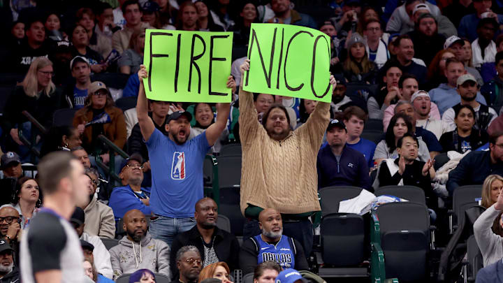 Dallas Mavericks fans with "Fire Nico" sign