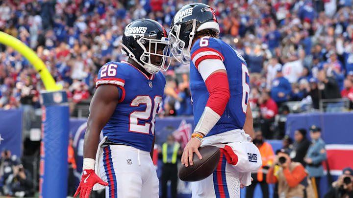 Nov 2, 2025; East Rutherford, New Jersey, USA; New York Giants quarterback Jaxson Dart (6) celebrates his touchdown run with running back Devin Singletary (26) during the second half at MetLife Stadium. Nov 2, 2025; East Rutherford, New Jersey, USA; New York Giants quarterback Jaxson Dart (6) celebrates his touchdown run with running back Devin Singletary (26) during the second half at MetLife Stadium.