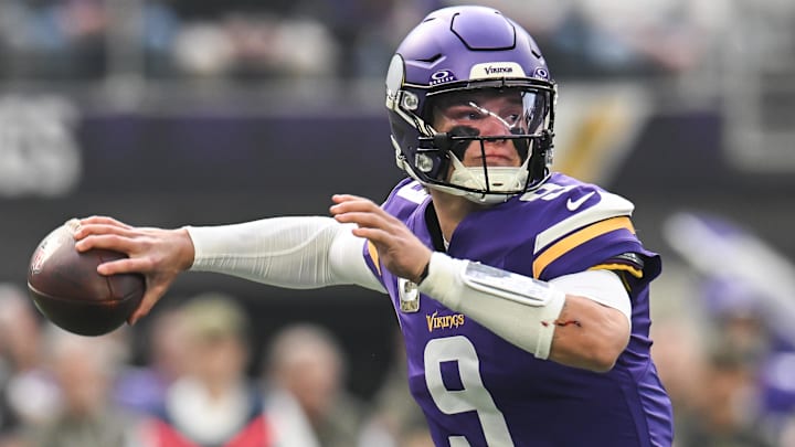 Nov 9, 2025; Minneapolis, Minnesota, USA; Minnesota Vikings quarterback J.J. McCarthy (9) throws a pass against the Baltimore Ravens during the first quarter at U.S. Bank Stadium.