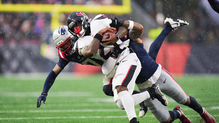 Jan 18, 2026; Foxborough, MA, USA; Houston Texans running back Woody Marks (27) carries the ball in the first half against the New England Patriots in an AFC Divisional Round game at Gillette Stadium. Mandatory Credit: David Butler II-Imagn Images