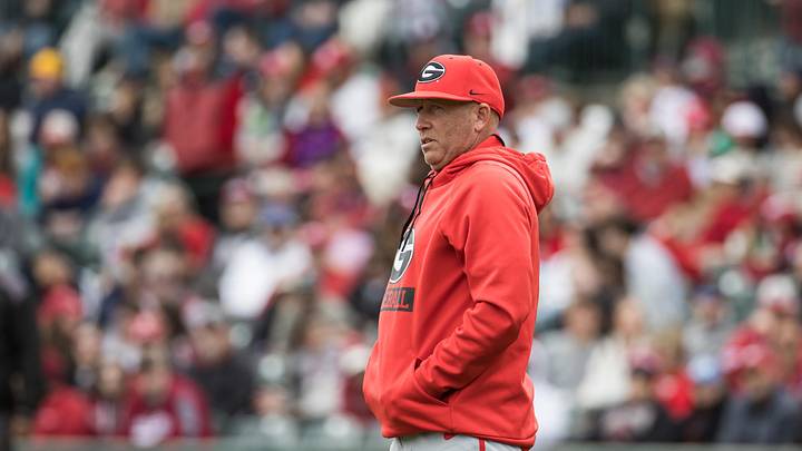 Apr 18, 2026; Fayetteville, AR, USA; Georgia Bulldogs head coach Wes Johnson walks out to the mound during the fifth inning against the Arkansas Razorbacks at Baum-Walker Stadium. Georgia won 26-14. Mandatory Credit: Brett Rojo-Imagn Images