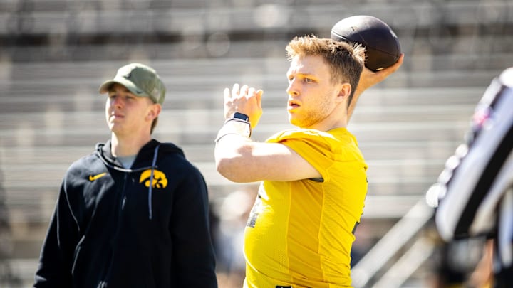 Apr 26, 2025; Iowa City, IA, USA; Iowa quarterback Mark Gronowski (11) throws during a spring NCAA football open practice at Kinnick Stadium. Mandatory Credit: Joseph Cress-The Des Moines Register Apr 26, 2025; Iowa City, IA, USA; Iowa quarterback Mark Gronowski (11) throws during a spring NCAA football open practice at Kinnick Stadium. Mandatory Credit: Joseph Cress-The Des Moines Register