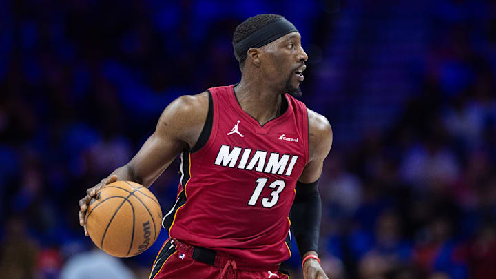Apr 17, 2024; Philadelphia, Pennsylvania, USA; Miami Heat center Bam Adebayo (13) controls the ball against the 76ers. 