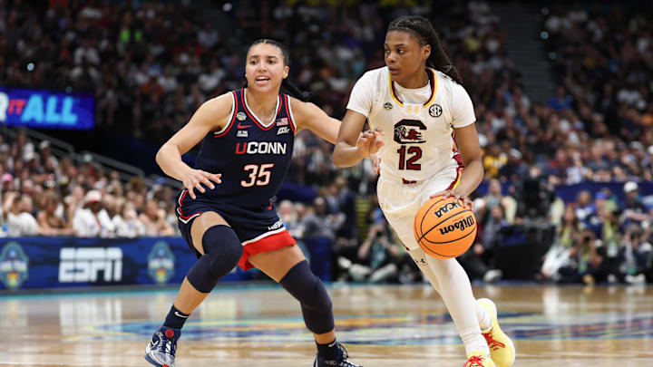 Apr 6, 2025; Tampa, FL, USA; Connecticut Huskies guard Azzi Fudd (35) defends against South Carolina Gamecocks guard MiLaysia Fulwiley (12) during the second half of the national championship of the women's 2025 NCAA tournament at Amalie Arena. Mandatory Credit: Nathan Ray Seebeck-Imagn Images