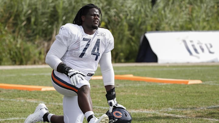 Chicago Bears offensive tackle Germain Ifedi (74) stretches during training camp at Halas Hall in 2020. Chicago Bears offensive tackle Germain Ifedi (74) stretches during training camp at Halas Hall in 2020.