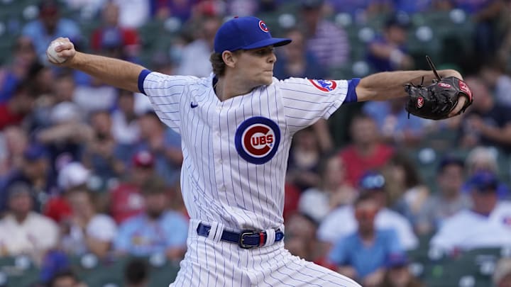 Sep 26, 2021: Chicago Cubs relief pitcher Codi Heuer (12) pitches against the St. Louis Cardinals during the eighth inning at Wrigley Field. M