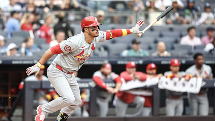 Sep 1, 2024; Bronx, New York, USA;  St. Louis Cardinals third baseman Nolan Arenado (28) hits a single in the first inning against the New York Yankees at Yankee Stadium.