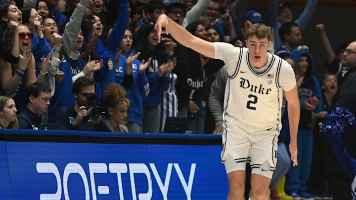 Jan 11, 2025; Durham, North Carolina, USA; Duke Blue Devils forward Cooper Flagg (2) reacts to hitting a three-pointer during the first half against the Notre Dame Fighting Irish at Cameron Indoor Stadium. Mandatory Credit: Rob Kinnan-Imagn Images Jan 11, 2025; Durham, North Carolina, USA; Duke Blue Devils forward Cooper Flagg (2) reacts to hitting a three-pointer during the first half against the Notre Dame Fighting Irish at Cameron Indoor Stadium. Mandatory Credit: Rob Kinnan-Imagn Images