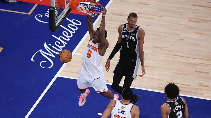 Jun 8, 2026; New York, New York, USA; San Antonio Spurs forward Victor Wembanyama (1) and guard Dylan Harper (2) react as New York Knicks forward OG Anunoby (8) dunks the ball during game three of the 2026 NBA Finals in the second quarter at Madison Square Garden. Mandatory Credit: Wendell Cruz-Imagn Images Jun 8, 2026; New York, New York, USA; San Antonio Spurs forward Victor Wembanyama (1) and guard Dylan Harper (2) react as New York Knicks forward OG Anunoby (8) dunks the ball during game three of the 2026 NBA Finals in the second quarter at Madison Square Garden. Mandatory Credit: Wendell Cruz-Imagn Images