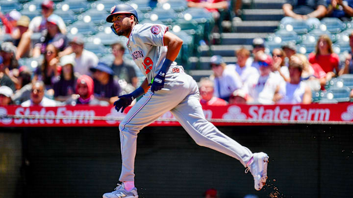 Jun 29, 2025; Anaheim, California, USA;  Washington Nationals left fielder James Wood (29) hits a single against the Los Angeles Angels during the first inning at Angel Stadium. 