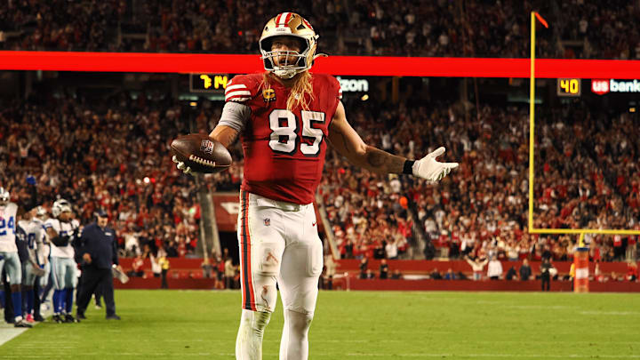 Oct 27, 2024; Santa Clara, California, USA; San Francisco 49ers tight end George Kittle (85) questions the flag thrown after scoring a touchdown against the Dallas Cowboys during the third quarter at Levi's Stadium. Mandatory Credit: Kelley L Cox-Imagn Images
