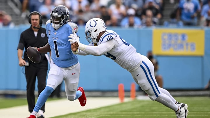 Sep 21, 2025; Nashville, Tennessee, USA; Indianapolis Colts defensive tackle Deforest Buckner (99) pushes Tennessee Titans quarterback Cam Ward (1) out of bounds during the second quarter at Nissan Stadium. Mandatory Credit: Steve Roberts-Imagn Images Sep 21, 2025; Nashville, Tennessee, USA; Indianapolis Colts defensive tackle Deforest Buckner (99) pushes Tennessee Titans quarterback Cam Ward (1) out of bounds during the second quarter at Nissan Stadium. Mandatory Credit: Steve Roberts-Imagn Images