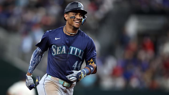 Seattle Mariners center fielder Julio Rodriguez reacts after hitting a home run against the Texas Rangers on Friday at Globe Life Field. Seattle Mariners center fielder Julio Rodriguez reacts after hitting a home run against the Texas Rangers on Friday at Globe Life Field.