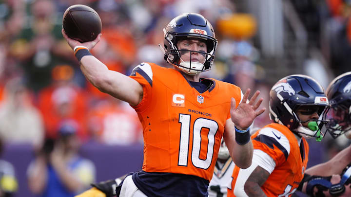 Dec 14, 2025; Denver, Colorado, USA; Denver Broncos quarterback Bo Nix (10) throws downfield during the second quarter against the Green Bay Packers at Empower Field at Mile High. Dec 14, 2025; Denver, Colorado, USA; Denver Broncos quarterback Bo Nix (10) throws downfield during the second quarter against the Green Bay Packers at Empower Field at Mile High.