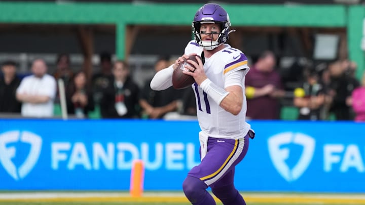 Sep 28, 2025; Dublin, Ireland; Minnesota Vikings quarterback Carson Wentz (11) looks downfield during the second quarter against the Pittsburgh Steelers during an NFL International Series game at Croke Park. Sep 28, 2025; Dublin, Ireland; Minnesota Vikings quarterback Carson Wentz (11) looks downfield during the second quarter against the Pittsburgh Steelers during an NFL International Series game at Croke Park.