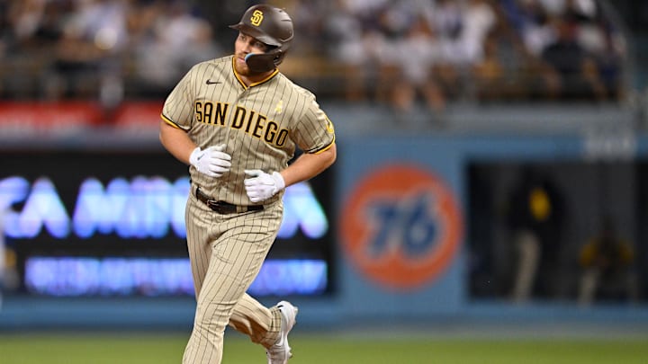Sep 2, 2022; Los Angeles, California, USA;  San Diego Padres third baseman Brandon Drury (17) rounds