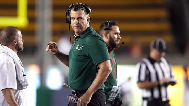 Oct 5, 2024; Berkeley, California, USA; Miami Hurricanes head coach Mario Cristobal walks on the field during the second quarter against the California Golden Bears at California Memorial Stadium. Mandatory Credit: Darren Yamashita-Imagn Images