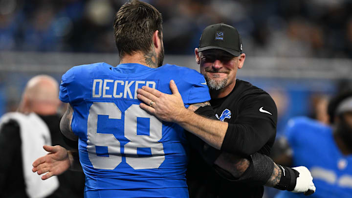 Nov 27, 2025; Detroit, Michigan, USA; Detroit Lions offensive tackle Taylor Decker (68) and Detroit Lions head coach Dan Campbell greet each other prior to the game against the Green Bay Packers at Ford Field. Nov 27, 2025; Detroit, Michigan, USA; Detroit Lions offensive tackle Taylor Decker (68) and Detroit Lions head coach Dan Campbell greet each other prior to the game against the Green Bay Packers at Ford Field.