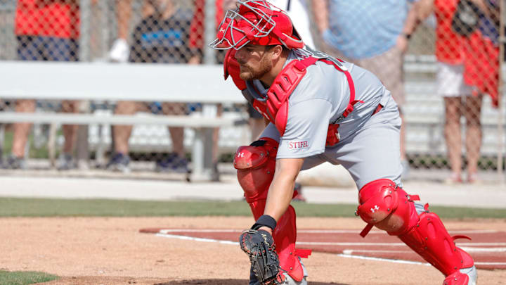 Feb 16, 2026; Jupiter, FL, USA;  St. Louis Cardinals catcher Pedro Pages (43) fields a ball during spring training workouts at Roger Dean Stadium. Mandatory Credit: Reinhold Matay-Imagn Images