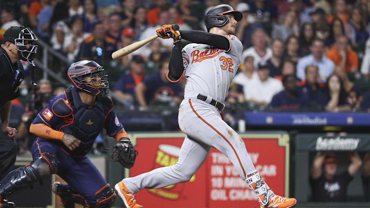 Sep 18, 2023; Houston, Texas, USA; Baltimore Orioles first baseman Ryan O'Hearn (32) drives in two runs with an RBI single during the fifth inning against the Houston Astros at Minute Maid Park.