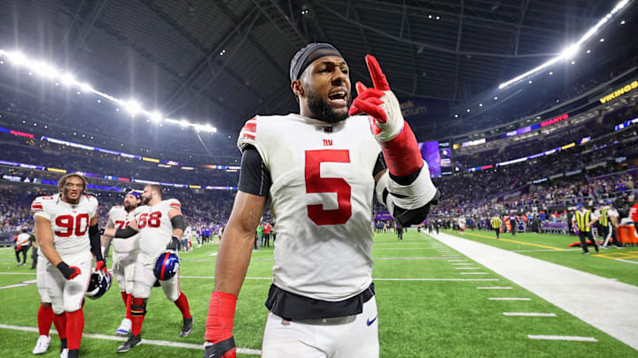Jan 15, 2023; Minneapolis, Minnesota, USA; New York Giants defensive end Kayvon Thibodeaux (5) reacts after winning a wild card game against the Minnesota Vikings at U.S. Bank Stadium. Mandatory Credit: Matt Krohn-Imagn Images