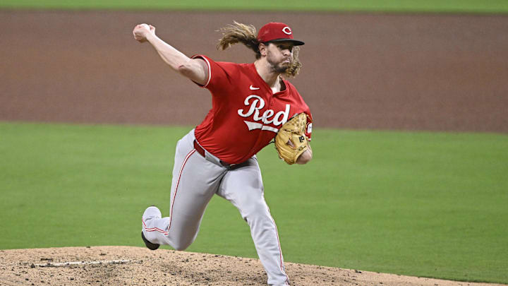 Sep 8, 2025; San Diego, California, USA; Cincinnati Reds relief pitcher Scott Barlow (58) delivers during the sixth inning against the San Diego Padres at Petco Park. Mandatory Credit: Denis Poroy-Imagn Images