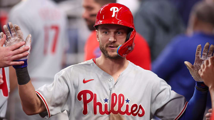 Jun 27, 2025; Atlanta, Georgia, USA; Philadelphia Phillies shortstop Trea Turner (7) celebrates with teammates after a home run against the Atlanta Braves in the ninth inning at Truist Park
