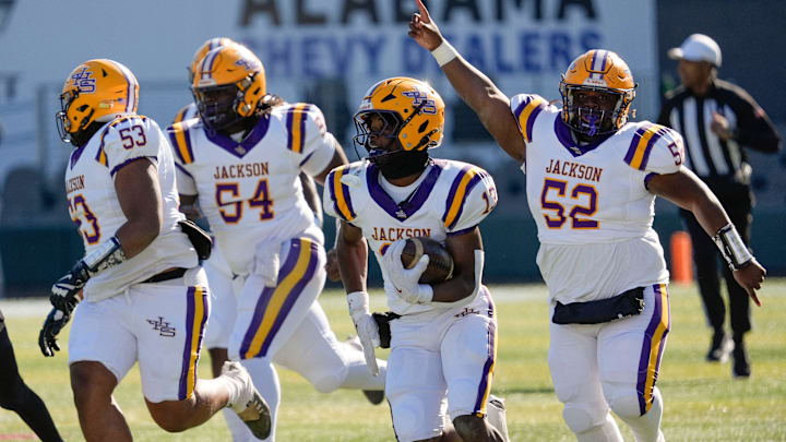 Dec 6, 2024; Birmingham, AL, USA; Jackson's Ezavier Crowell (13) breaks a long touchdown run on the Aggie’s first possession against Cherokee County at Protective Stadium in the AHSAA 4A State Championship game.