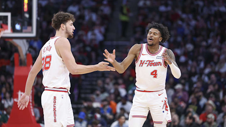Jan 6, 2024; Houston, Texas, USA; Houston Rockets guard Jalen Green (4) celebrate with center